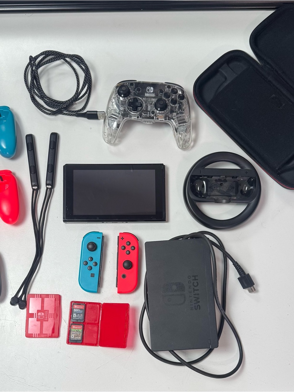 Nintendo Switch Console Bundle with Red & Blue Joy‑Con and Clear Pro Controller